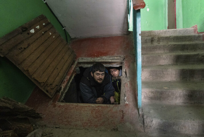 People take shelter from shelling in the basement in Mariupol, Ukraine, March 12 2022.