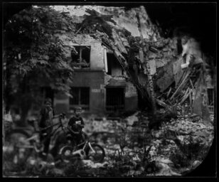Kids in front of ruins of the sanitary station. Lysychans'k. Sievierodonetsk area of the Luhansk District. 14th June. some days before ocupation.