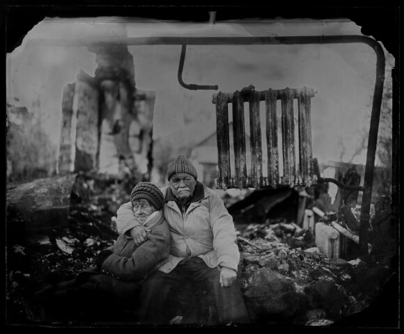 Anatoliy Michailovich with his wife Vera Sergeevna at ruins of thier house that was bomed out in March 2022. 14.12.2022