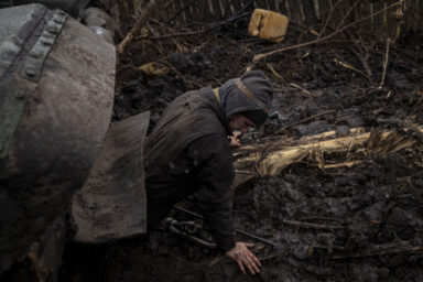 NYTUKRAINE

A Ukrainian service member worked to move equipment and parts from a broken down T-72 tank to a functioning one, as seen in a village in the Donetsk region, Ukraine, Thursday, January 5, 2023. Almost all battalions stationed in the village are fighting on the frontline for the gateway city of Kreminna, in Luhansk region.