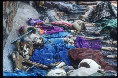218317 39: A skull disintegrates as victims of the genocidal campaign planned by Hutu extremists, their bodies smashed by clubs and machetes, lay strewn across the Nyarubuye parish in June, 1994, in Rwanda. Following the assassination of President Juvenal Habyarimana in April, 1994, a genocide of unprecedented swiftness left 800,000 Tutsis and moderate Hutus dead in 100 days at the hands of organized bands of militia. (Photo by Scott Peterson/Liaison)