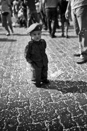Caracas - Venezuela. A kid desgusied in Hugo Chavez military uniform celebrates carnival in the streets of Caracas downtown. Government have organized activities to retake and rebuilt some public places in order to give families an open space to have some collective activities. In last years violence and lack of money have make the collective recreation the exception in Caracas life.