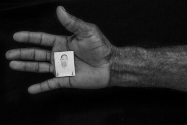 Guarico State - Venezuela. Mr. Enzo XXXX shows his hand for a portrait holding a picture of his wife, Mrs XXXXXX, who died just days before in Universitary Hospital in Caracas after 16 days of hospitalization. Mrs. XXXXX was a patient with a transplant but due to lack of medicines she got health complications, lost the transplant and then died.