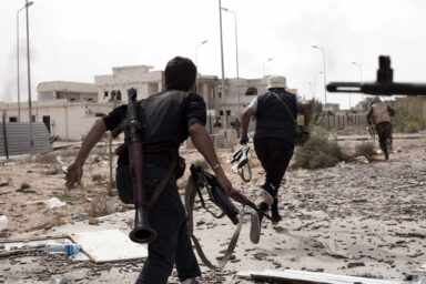 CAPTION in Sirt, Libia, Friday October 7 2011. Photo by Enrico Dagnino.Withe Units of the "Morning of 17 of February".The final attack on Sirt start t, The Gheddafi loyalist are trapped inside Medina and fight to the end go in on all day.