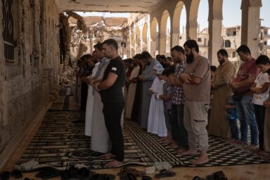 Long neglected by the Syrian state and one of the first cities to rise up in the 2011 revolution, Deir al-Zour endured years of siege, bombardment, and successive occupation by government forces, ISIS, and Kurdish-led fighters. The conflict left around 75% of the city’s infrastructure damaged or destroyed. In 2025, the Euphrates River marked a divide; the government controlled one bank, the Kurdish-led Syrian Democratic Forces (SDF) the other, complicating daily movement, trade, and access to services. For those who remained, and those who returned, rebuilding continued regardless. Photo by Nicole Tung (VII Photo, for The New York Times)