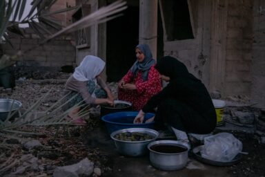 Long neglected by the Syrian state and one of the first cities to rise up in the 2011 revolution, Deir al-Zour endured years of siege, bombardment, and successive occupation by government forces, ISIS, and Kurdish-led fighters. The conflict left around 75% of the city’s infrastructure damaged or destroyed. In 2025, the Euphrates River marked a divide; the government controlled one bank, the Kurdish-led Syrian Democratic Forces (SDF) the other, complicating daily movement, trade, and access to services. For those who remained, and those who returned, rebuilding continued regardless. Photo by Nicole Tung (VII Photo, for The New York Times)